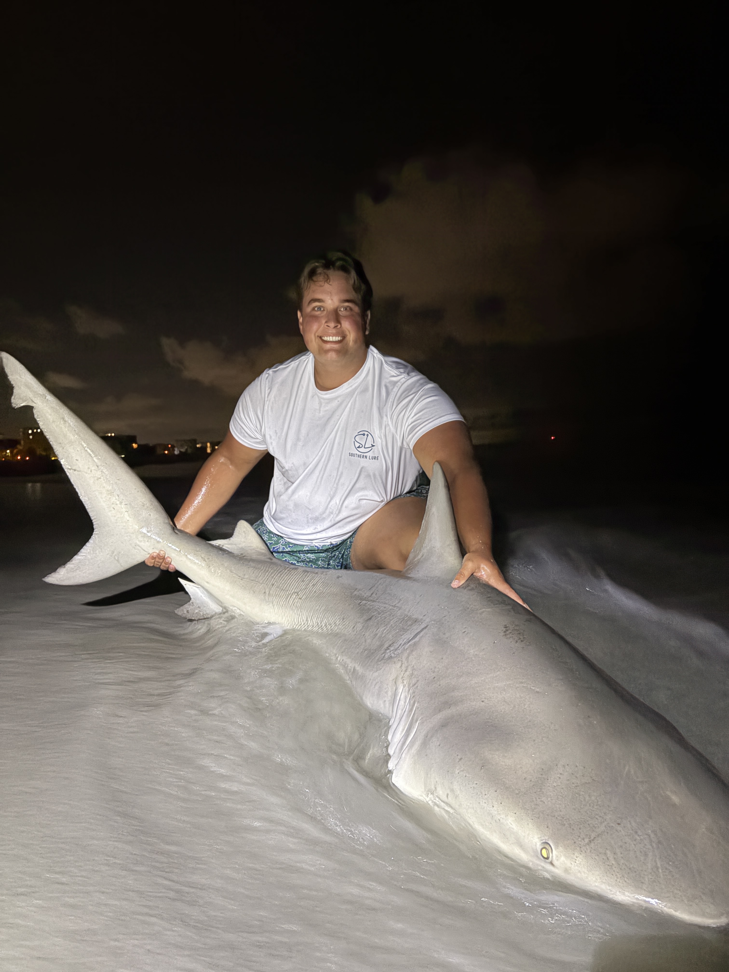 Bite Club guest with bull shark catch
