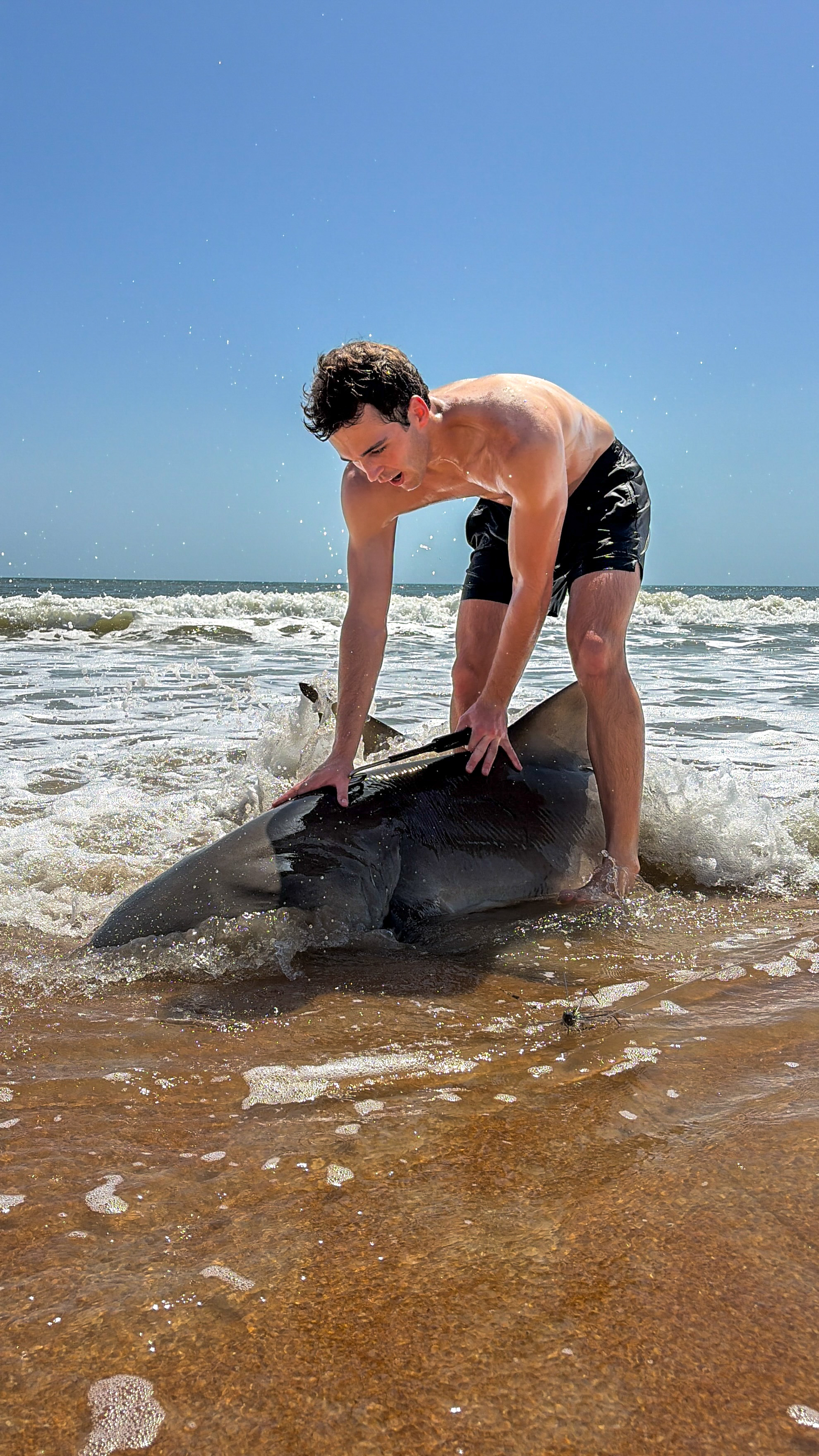 Bite Club guest with lemon shark catch